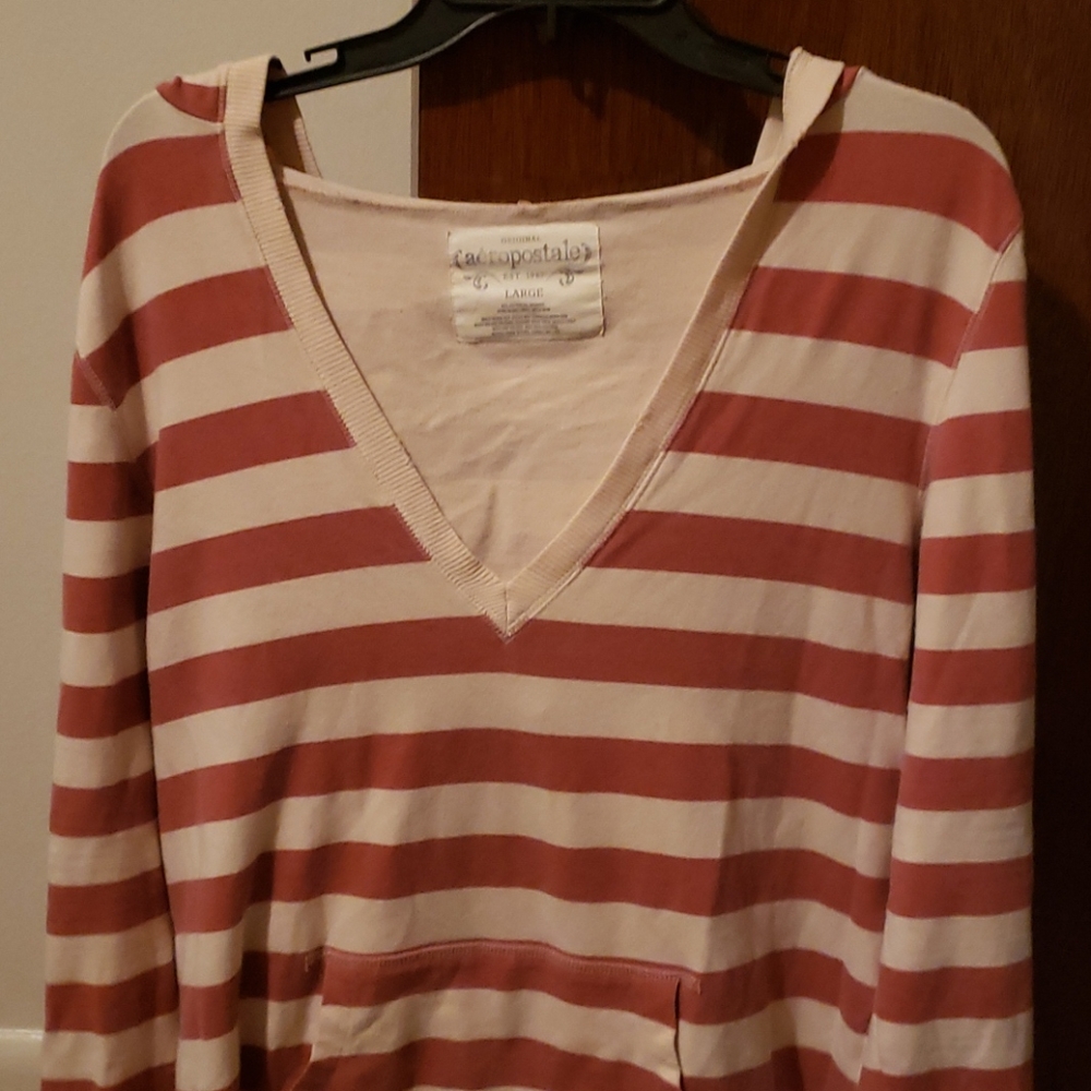 Strip shirt with a hood